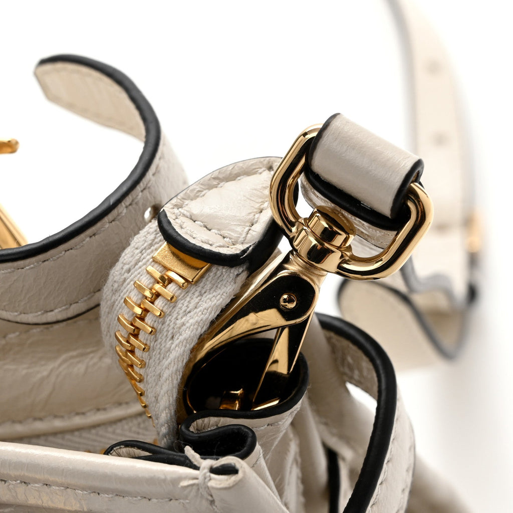 Glossy Calfskin Triangle Mini Bonnie Hand Bag White
