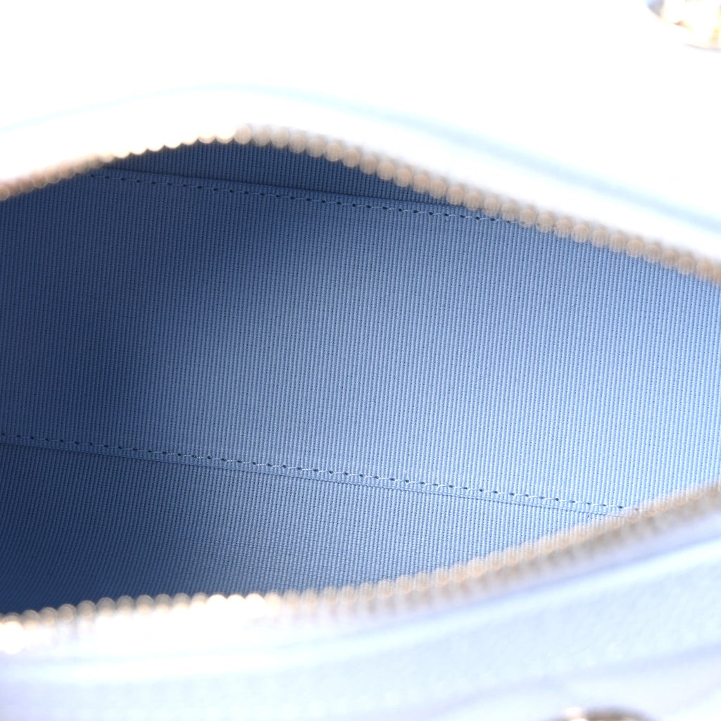 Caviar Quilted Barrel Clutch With Chain Light Blue