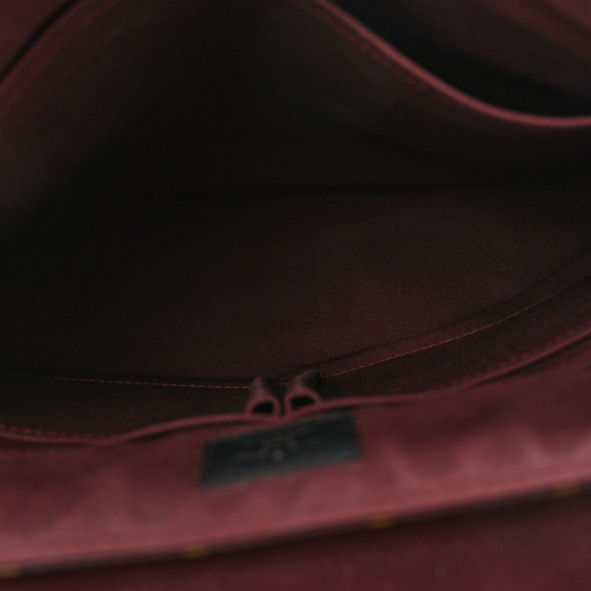 Monogram Macassar District MM