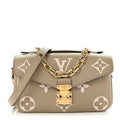 Empreinte Monogram Giant Pochette Metis East West Tourterelle Creme