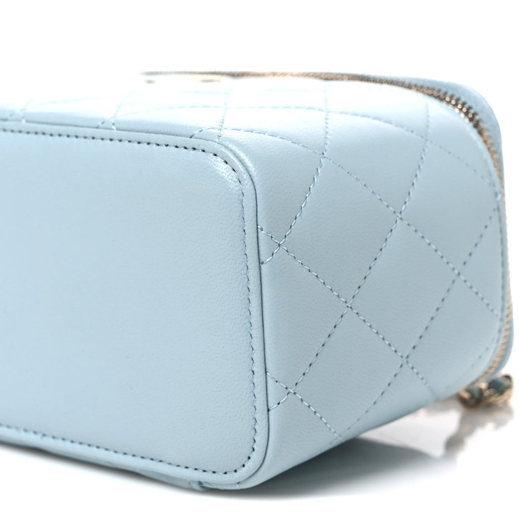 Lambskin Quilted Small Top Handle Vanity Case With Chain Light Blue