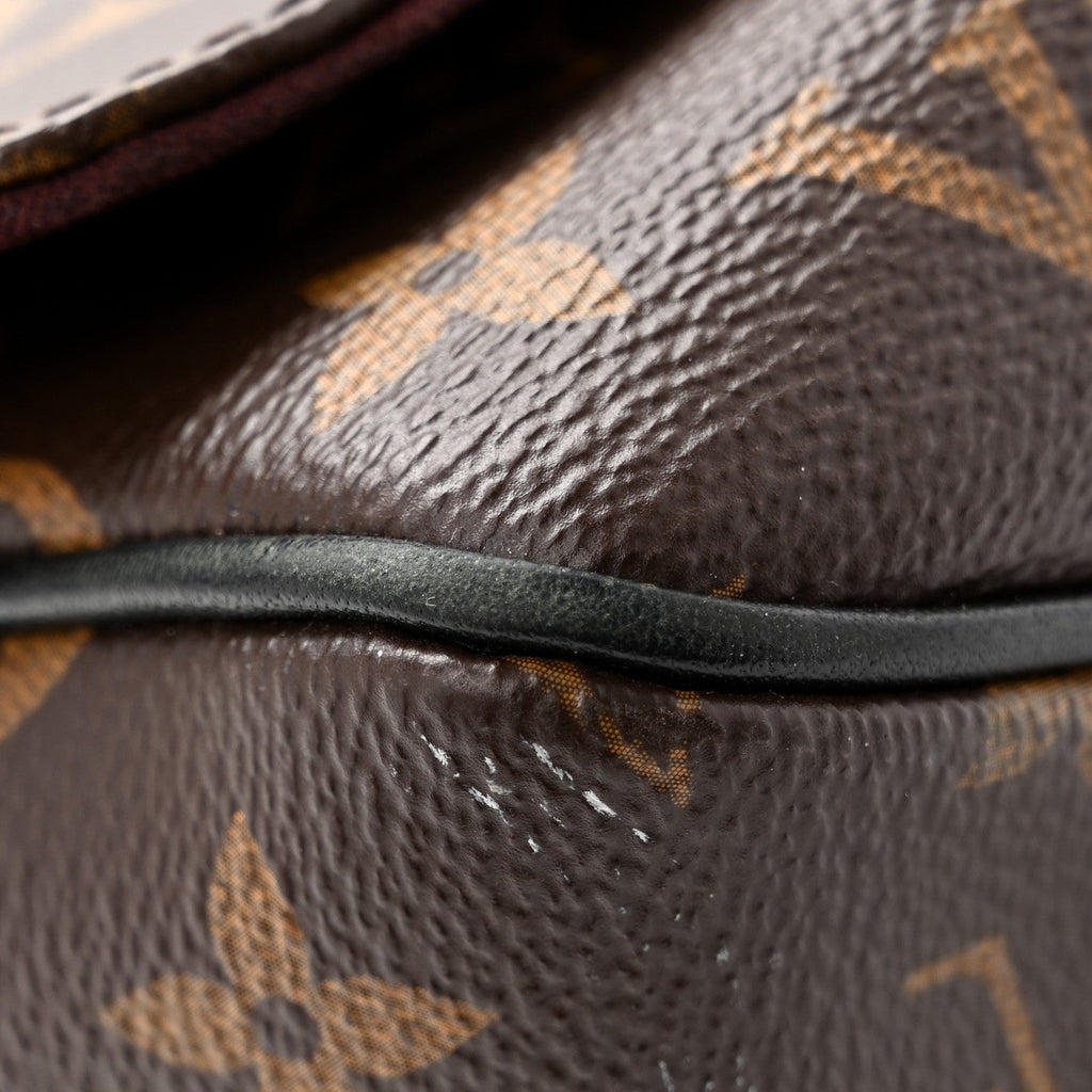 Monogram Macassar District MM